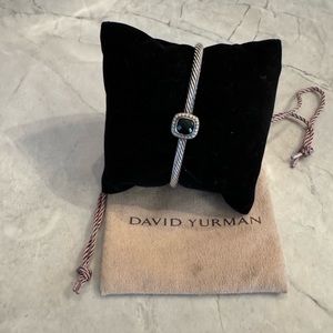 David Yurman bracelet black stone surrounded by diamonds.